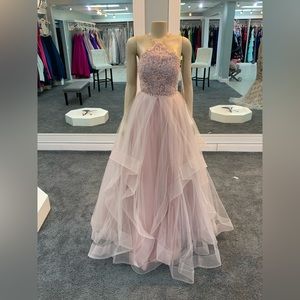 size 8. mauve color. halter top ballgown. lace embellishments. tulle bottom